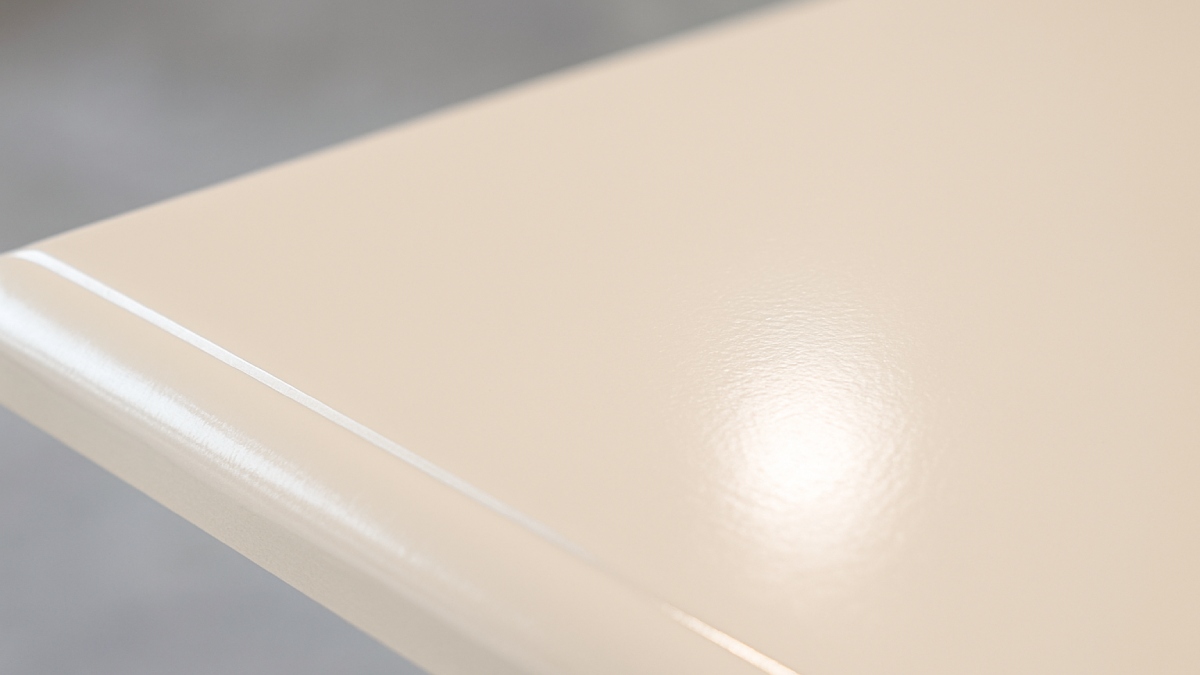 Close-up of painted cabinet surface showing smooth and glossy finish
